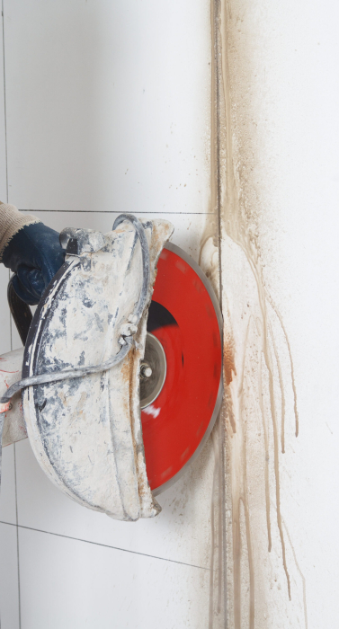 cutting-wall-with-electric-tool-scaled